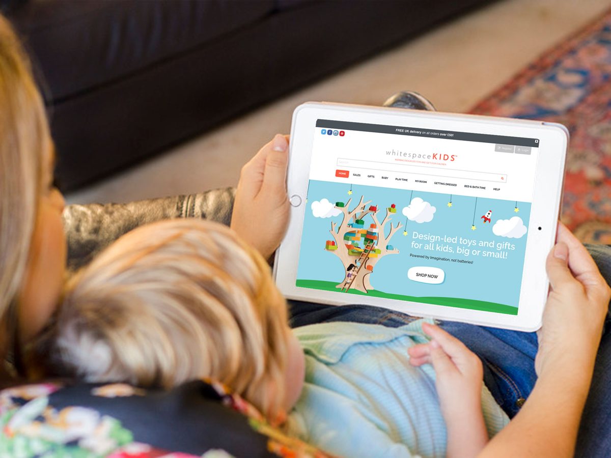Parent and child using a learning app on an iPad